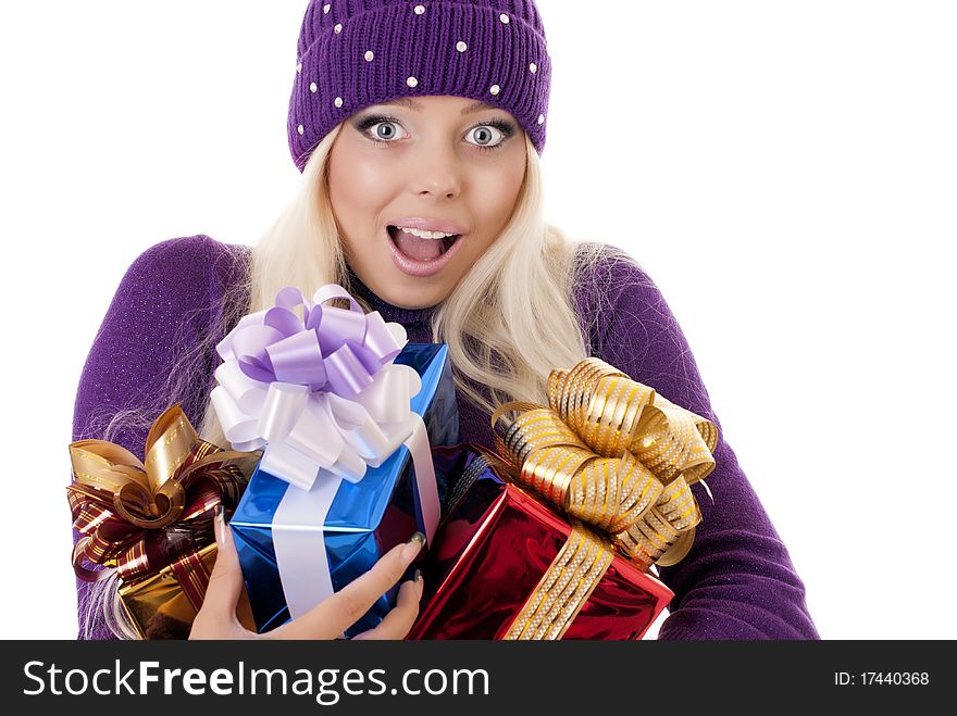 Girl holding a presents on white background