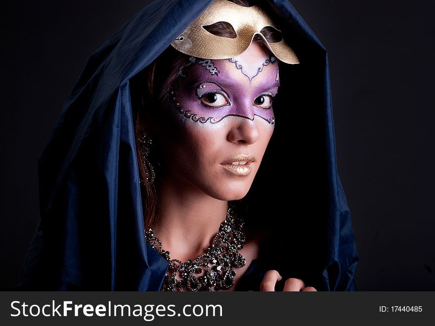 Studio portrait of a girl with art make-up. Studio portrait of a girl with art make-up