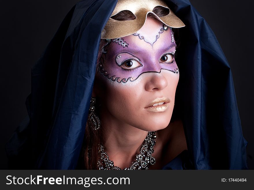 Studio portrait of a girl with art make-up