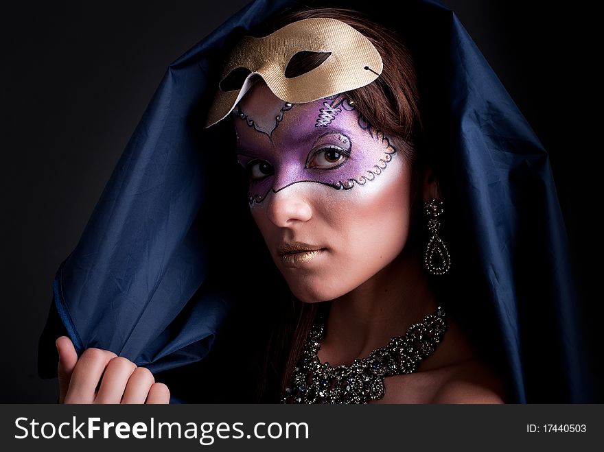 Studio portrait of a girl with art make-up