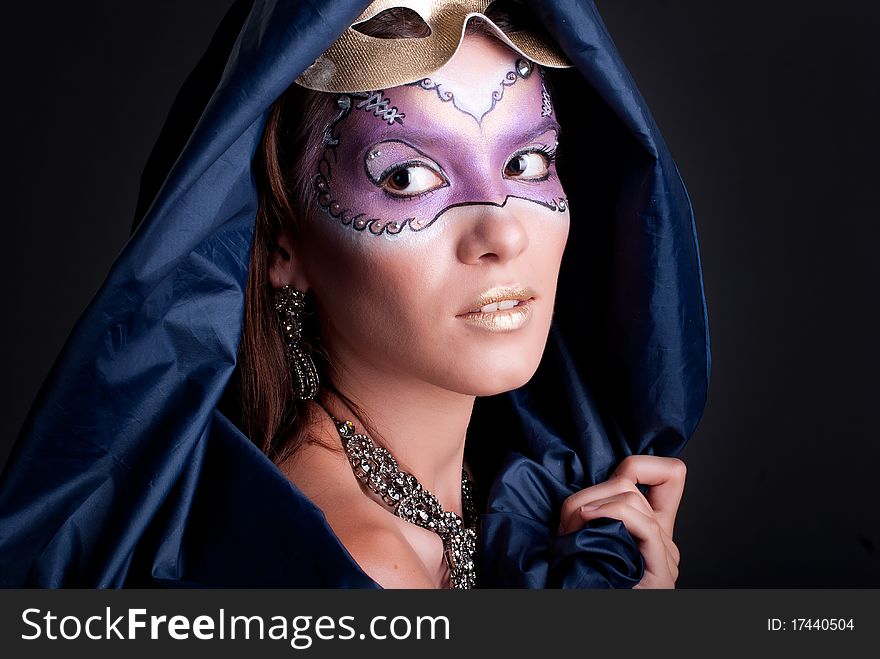 Studio portrait of a girl with art make-up