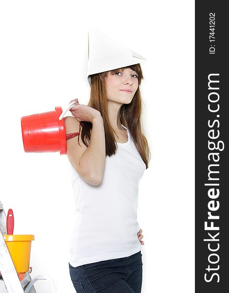 Studio portrait of attractive young woman ready for painting. Studio portrait of attractive young woman ready for painting