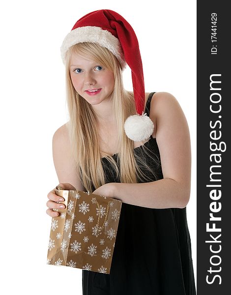 Young beautiful girl in a Santa hat on a white background