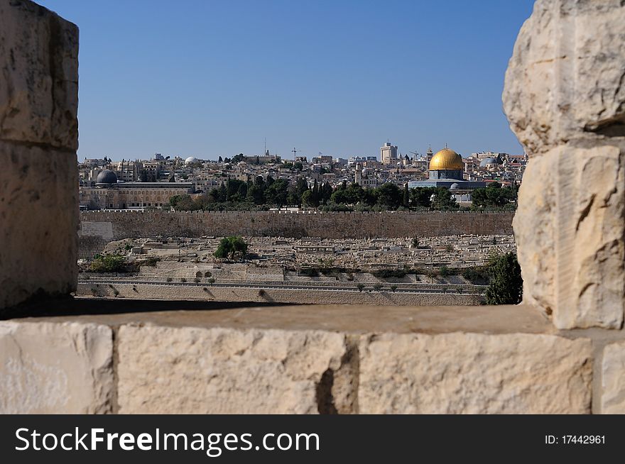 Glance through embrasure on Moria mosque Al Aqsa and Dome of the Rock. Glance through embrasure on Moria mosque Al Aqsa and Dome of the Rock