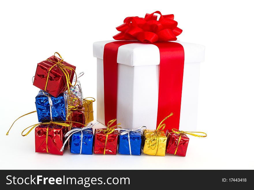 Multi colored gift boxes isolated on white