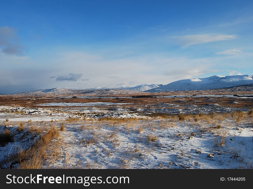 The first snowfall of the winter covers the barren landscape at Rannoch Moor