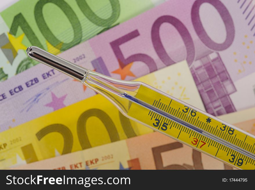 Medical thermometer and euro money. Medical thermometer and euro money