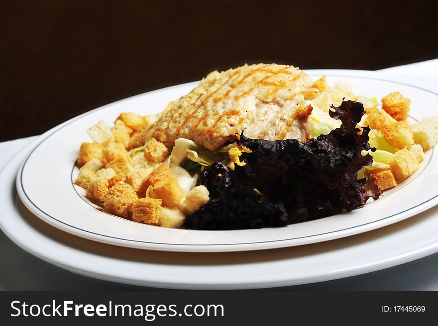 Fried chicken fillet with cheese and vegetables. salad