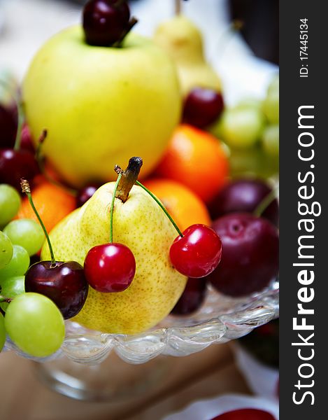 Fresh fruit on a festive platter on wedding table