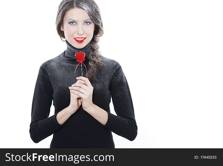 Beautiful smiling woman with heart on white background