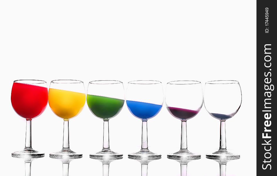 Six glasses with different color liquid. Six glasses with different color liquid