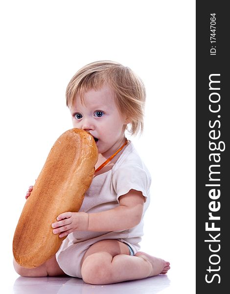 Baby holding a loaf of bread  isolated on white