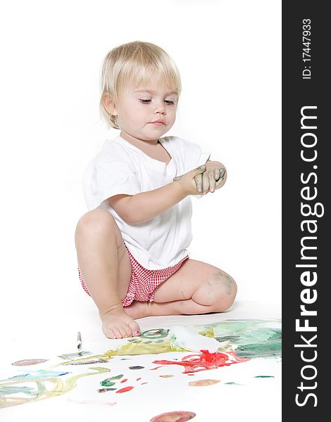 Child painting over white