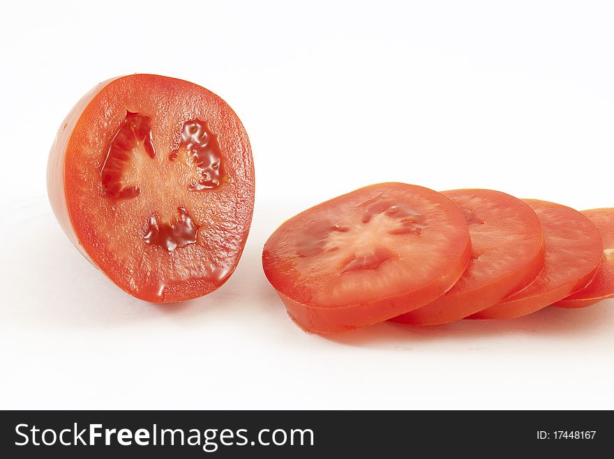 Fresh tomatoes isolated on white background