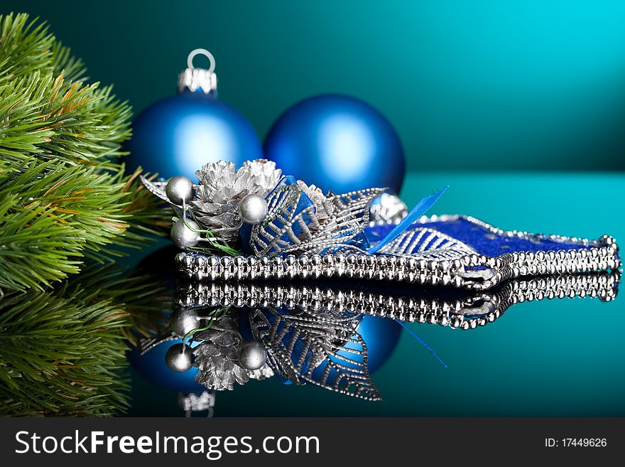 Branch of Christmas tree with festive ball