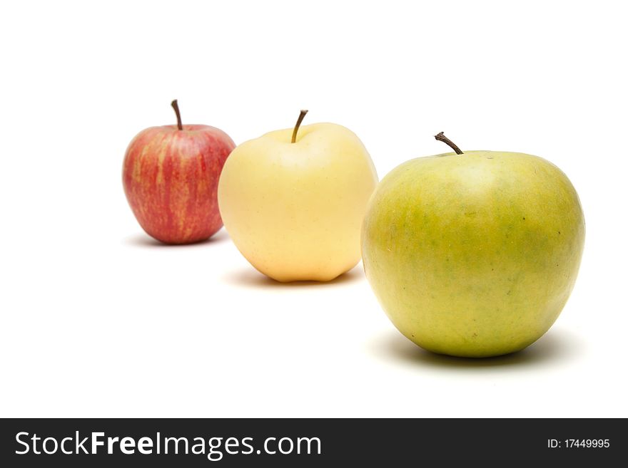 Rows of apples isolated on a white background. Rows of apples isolated on a white background