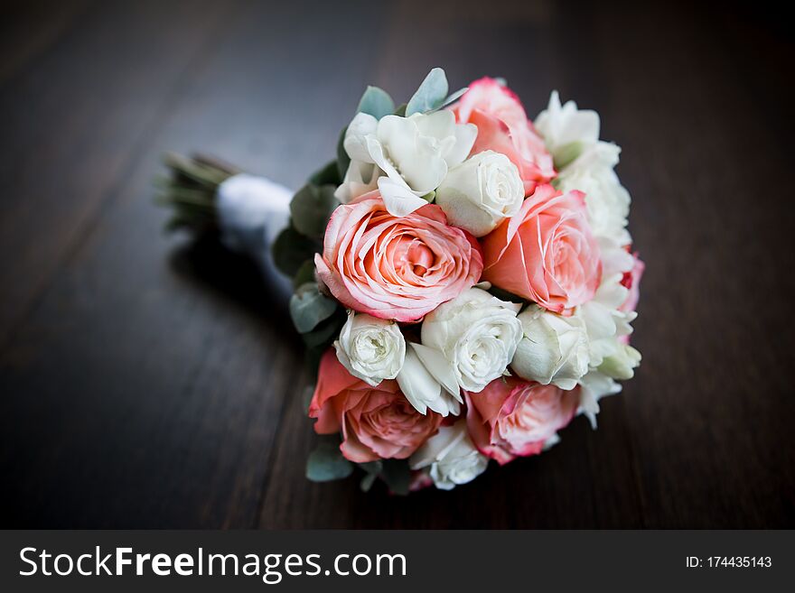 Wedding decoration bridal bouquet with flowers and wedding rings