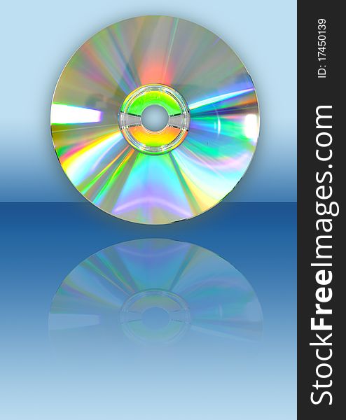 CD with reflection on blue background