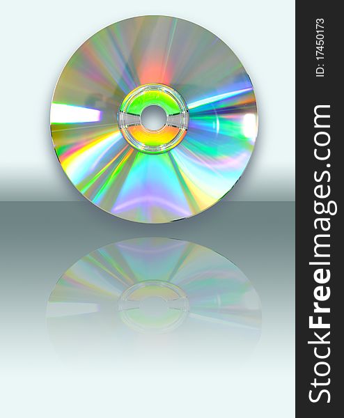 CD with reflection on blue background