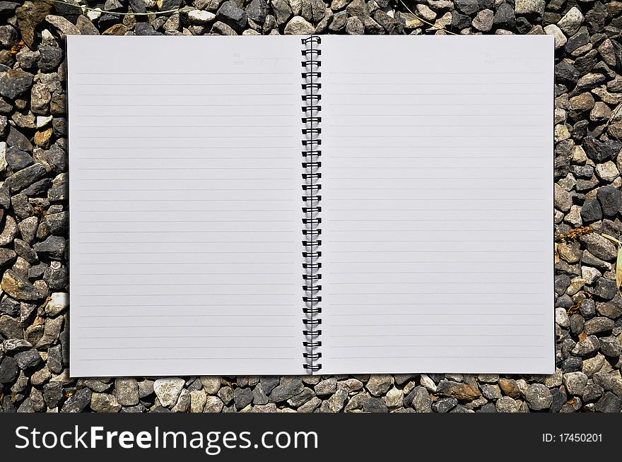 Empty notebook on Stone texture