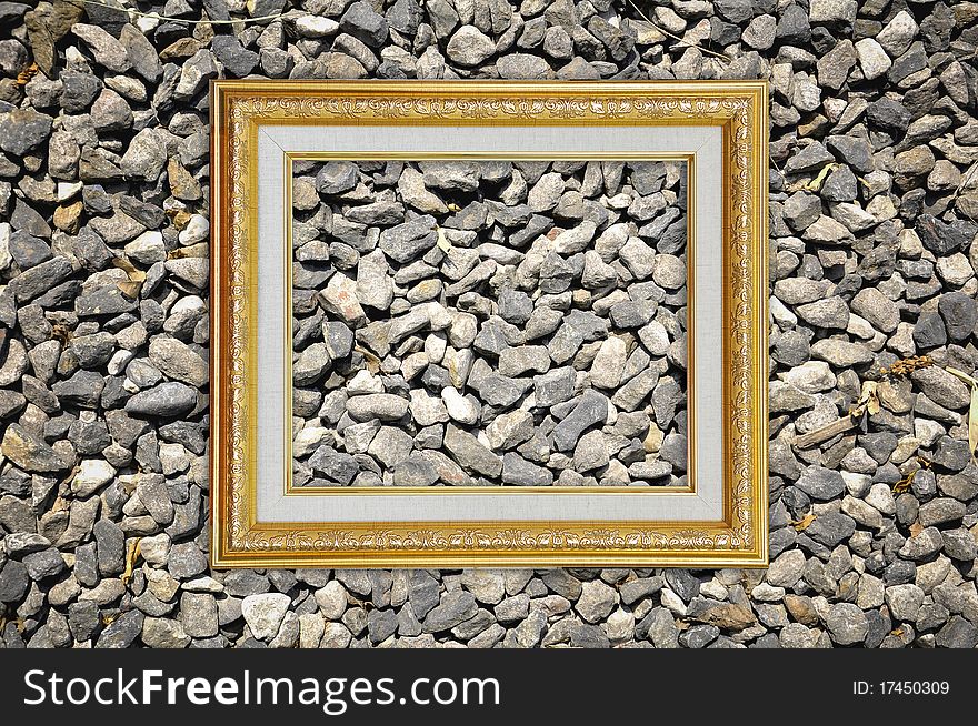 Golden Picture Frame on Stone texture