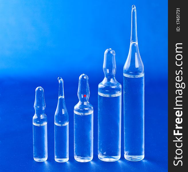 Ampoules on a blue background