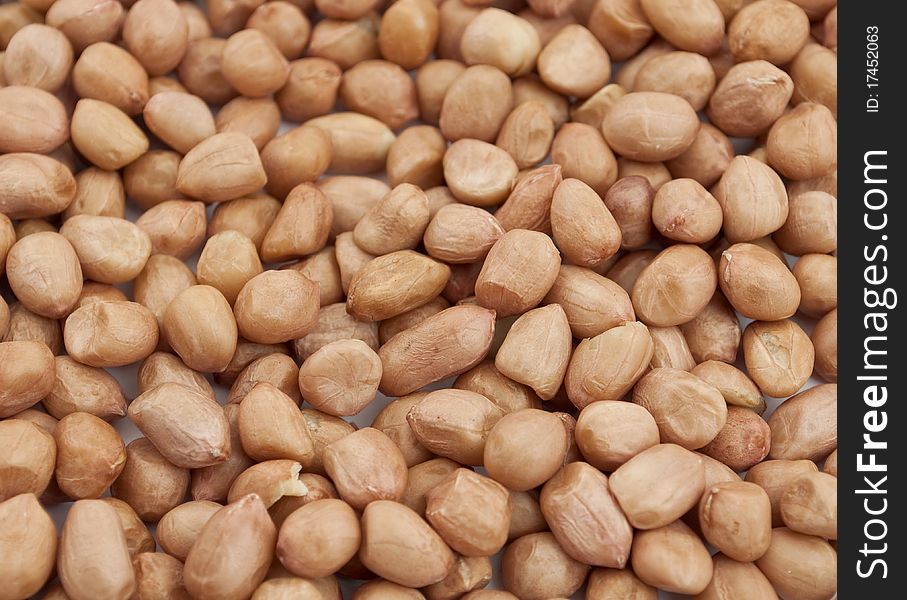 Brown peanuts texture, backgrounds closeup