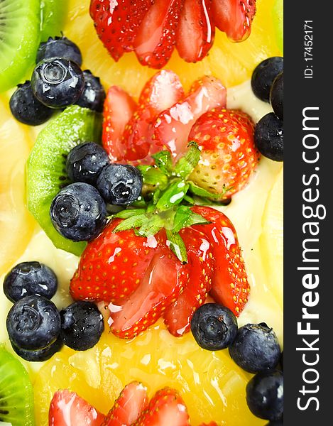 Tart with variety of fruit with cream. Tart with variety of fruit with cream
