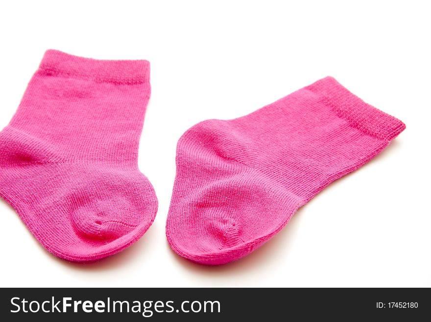 Colored child stockings onto white background