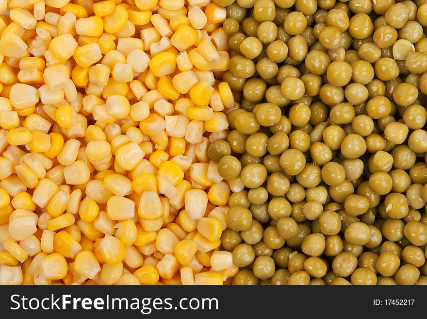 Yellow corn and green beans are stacked background