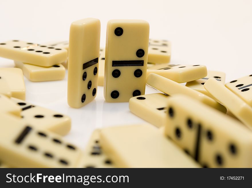 Domino-laying bricks on white background