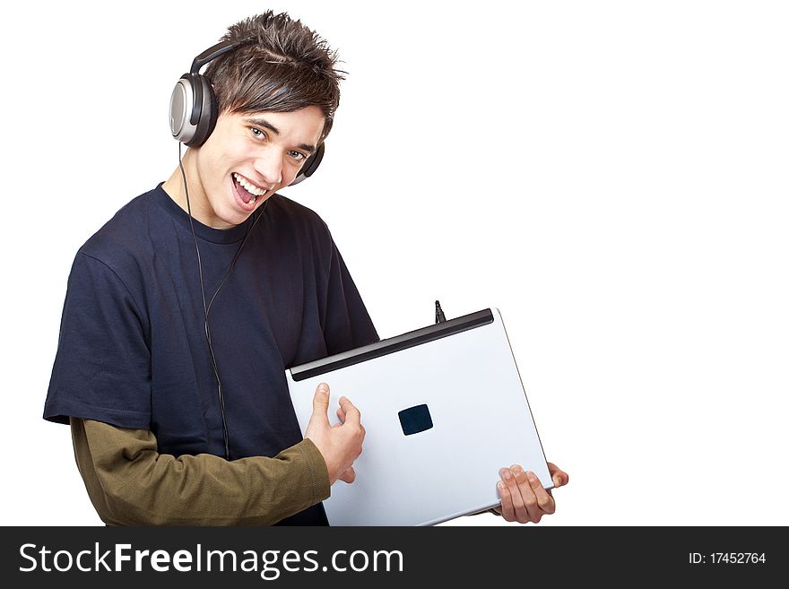 Teenager With Headphones Plays Guitar On Laptop