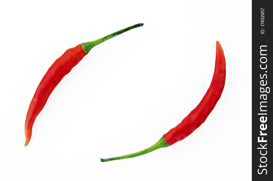Two chili paprika rounded as recycle sign. Two chili paprika rounded as recycle sign