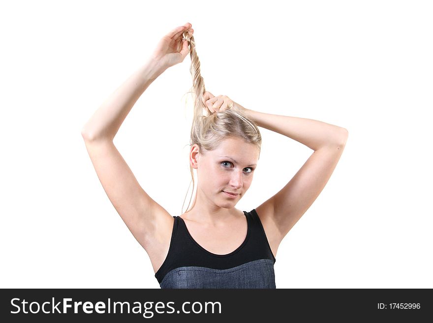 woman making her hairstyle isolated on white