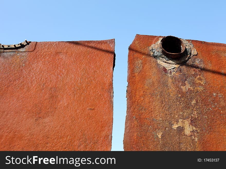 Rusted metal and blue sky