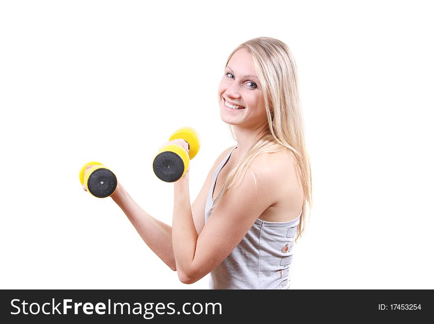 Woman with dumbbells in her hands isolated on white background. Woman with dumbbells in her hands isolated on white background