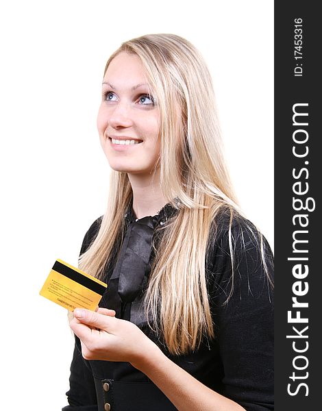 woman thinking about shopping holding credit card in the hand