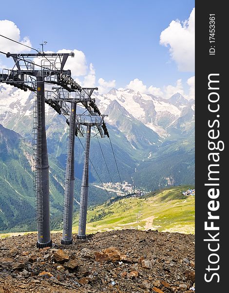 Three supports of mountain ropeway standing on a slope. Three supports of mountain ropeway standing on a slope.