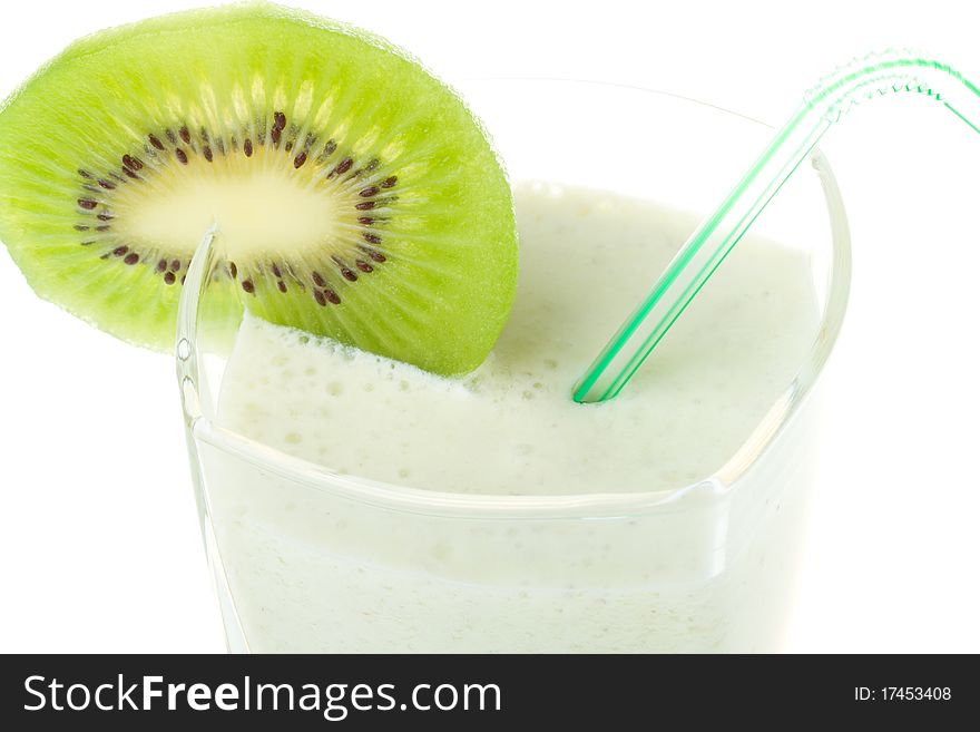 Close-up milk shake with kiwi and straw, isolated on white