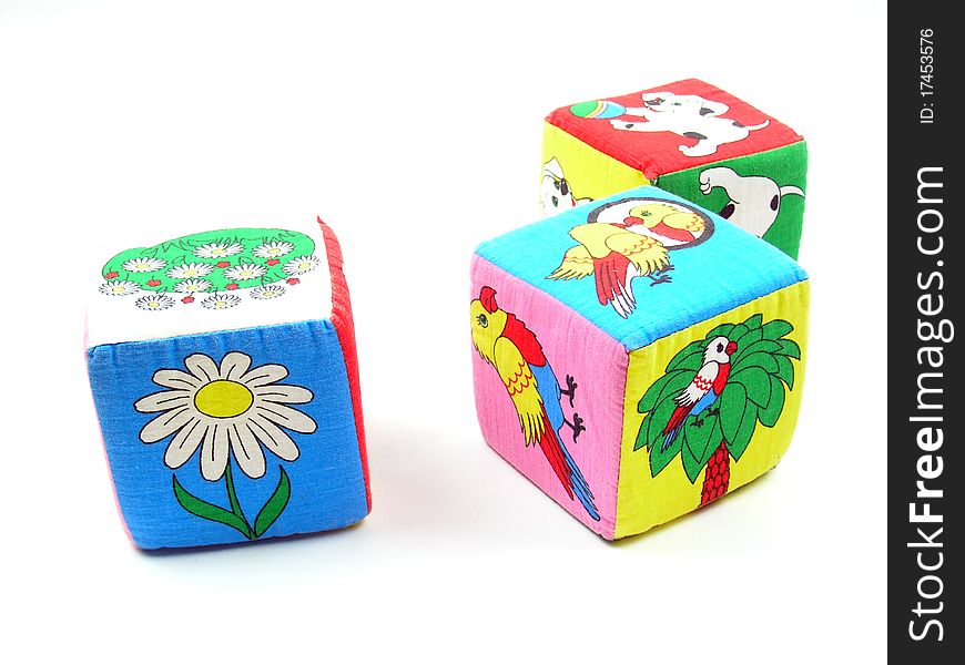 Colorful wooden toy blocks isolated on white background