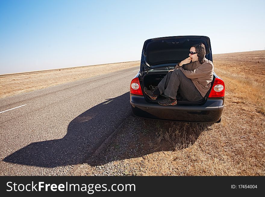 Man in trunk of car