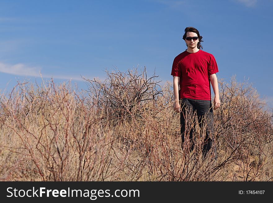 Man in red shirt outdoors