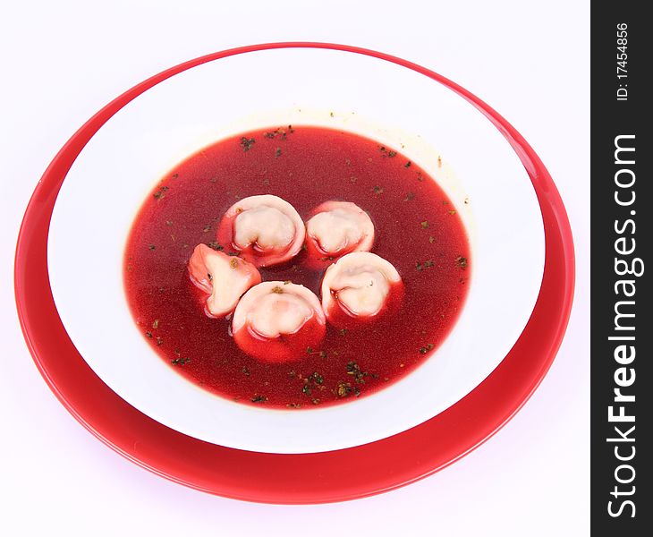 Traditional polish Christmas Eve dish: clear borscht with uszka (a mushroom filled kind of dumplings). Traditional polish Christmas Eve dish: clear borscht with uszka (a mushroom filled kind of dumplings)