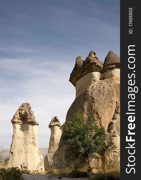 Fairy looking chimneys in Goreme valley in the aeria cappadocia in turkey. Fairy looking chimneys in Goreme valley in the aeria cappadocia in turkey