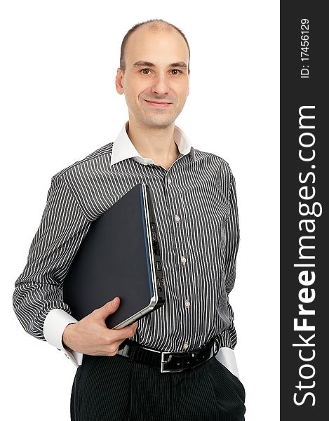 Young man holding a laptop over white background