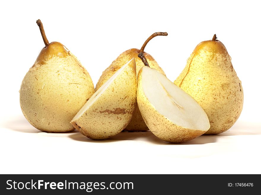 Close view detail of some pears isolated on a white background. Close view detail of some pears isolated on a white background.