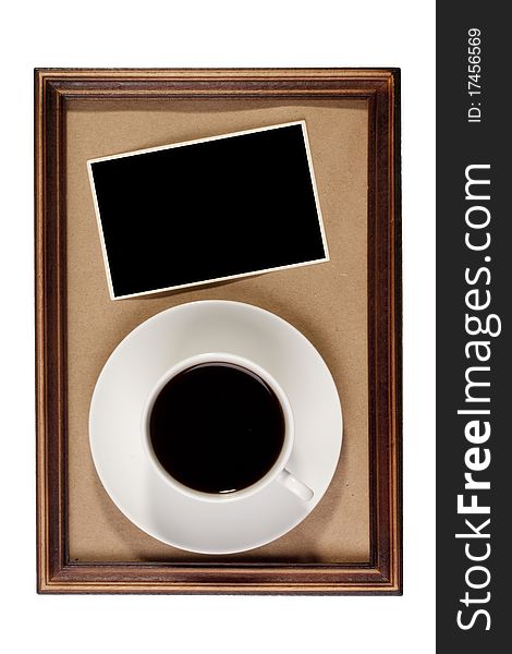 Wooden frame with paper craft in the background with a cup of coffee.