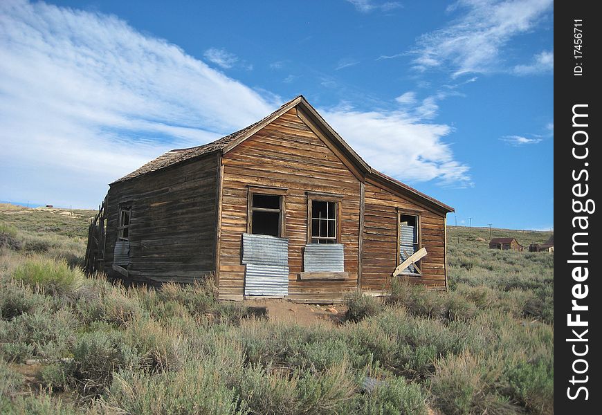 Abandonned building in Bodie, an original ghost town from the late 1800s, now a national historic landmark receiving 200,000+ visitors yearly. Abandonned building in Bodie, an original ghost town from the late 1800s, now a national historic landmark receiving 200,000+ visitors yearly.