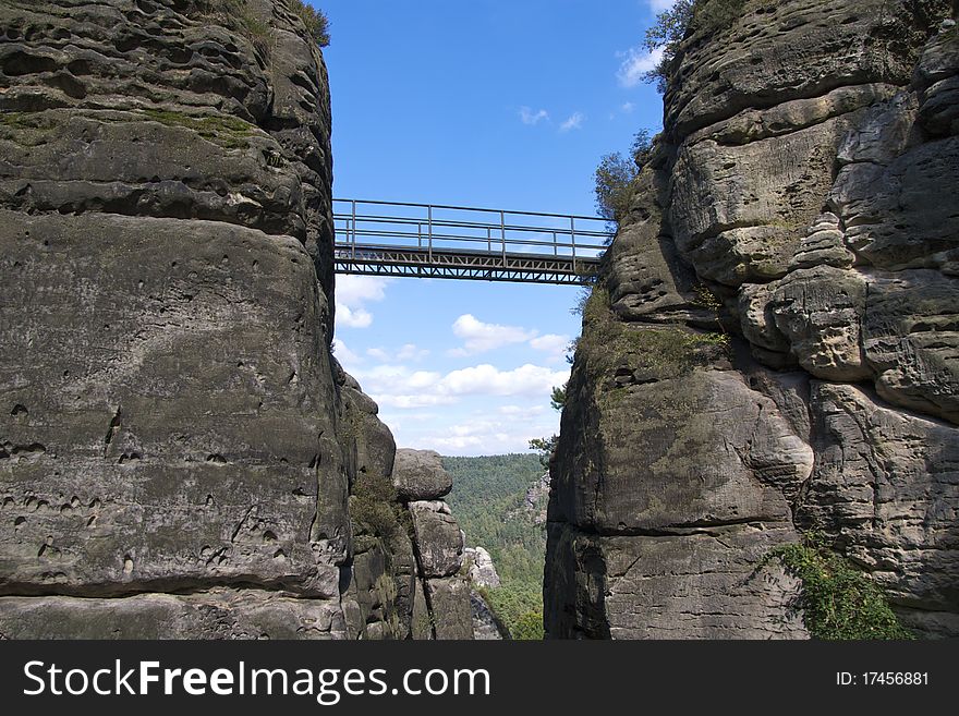 One of the many bridges connecting the rocks of Felsenburg (Rock Castle) Neurathen, a major Saxony tourist attration. One of the many bridges connecting the rocks of Felsenburg (Rock Castle) Neurathen, a major Saxony tourist attration