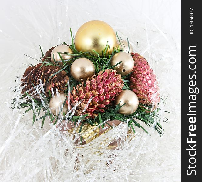 Christmas tree with a pinecone in tinsel